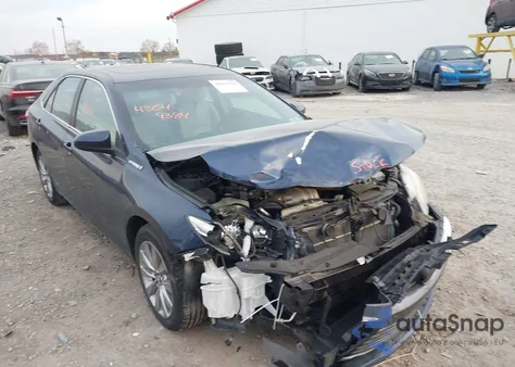 2015 Toyota Camry Hybrid Xle z USA, uszkodzony, nr VIN 4T1BD1FK4FU175330
